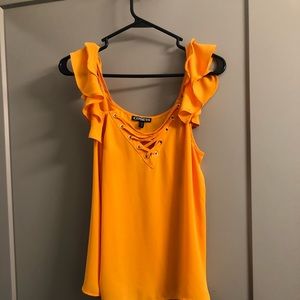 Express polyester off the shoulder tank top.